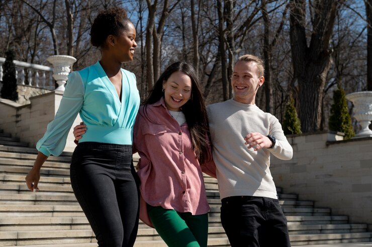 group friends celebrating lifting face mask restrictions outdoors 23 2149384568 -